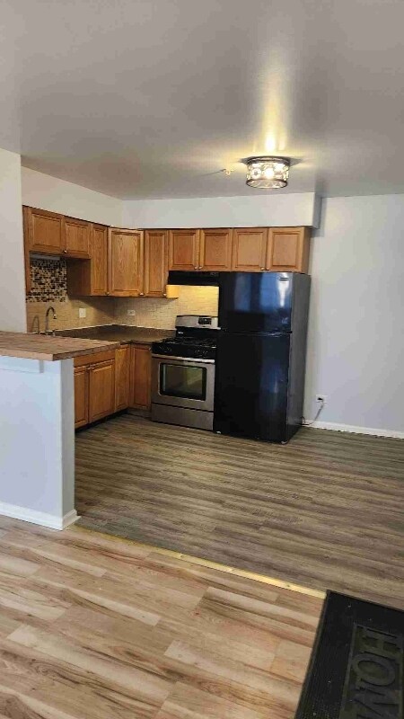 Building Photo - 4117-4123 Lindenwood Dr