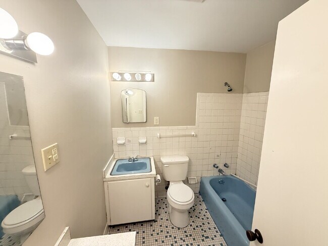 Building Photo - Welcome home to this charming 3-bedroom, 1.5-bathroom brick home featuring a spacious living and ...