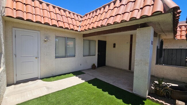 Building Photo - Updated 2 bedroom, 2 bath townhouse in Sahuara Village.