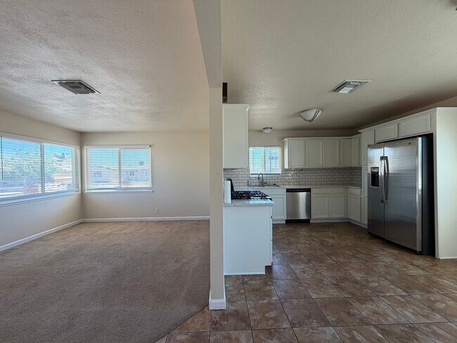 Building Photo - 3 Bedroom 2 Bathroom House with Central A/C , 2 Car Garage and Beautiful Backyard with Covered Patio