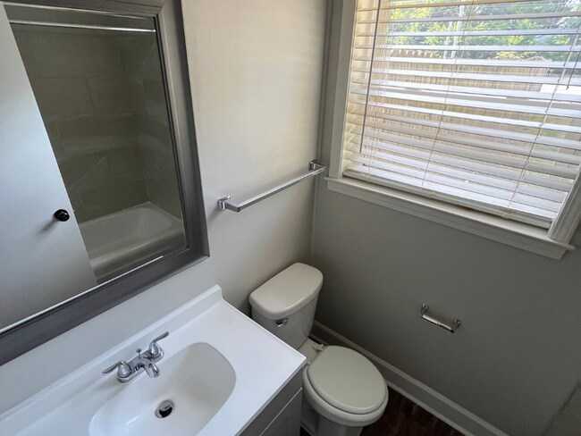 Building Photo - Spacious 4BR/2BA Memphis Home | 1,913 Sq Ft, Hardwood Floors, Brick Fireplace & Fenced Yard
