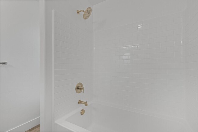 Building Photo - NEW HOME with large garage stalls and unfinished basement for additional storage