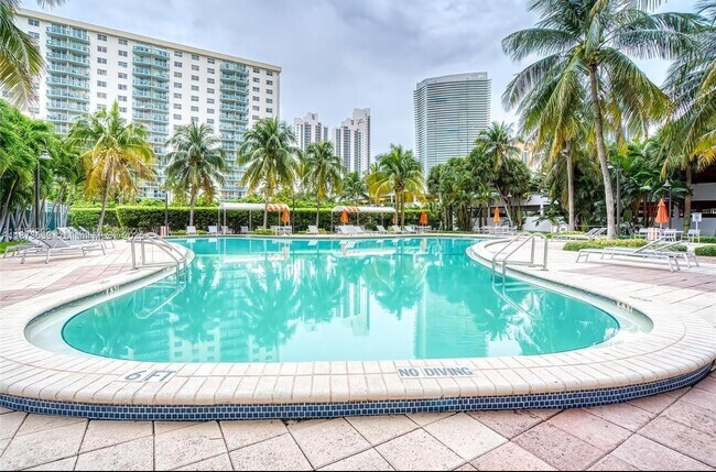 Building Photo - 19380 Collins Ave