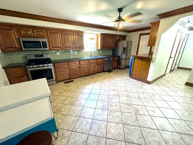 Building Photo - Charming Bungalow with Large Fenced Backya...