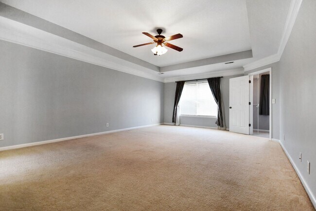 Building Photo - Pet Friendly Three Bedroom with Bonus!