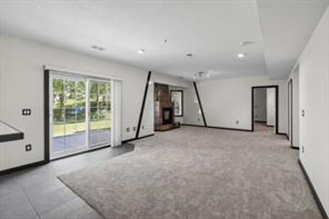 Building Photo - Spacious 5-Bed Walkout Home with Over 3,50...