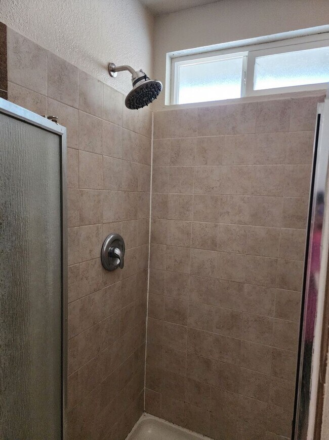 Building Photo - 3 bedroom 1 bath with Garage converted to ...