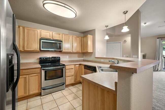 Building Photo - Spacious Top-Floor Condo in Las Casas at Broadmoor Bluffs | 2 Bed / 2 Bath + Garage, Very close t...
