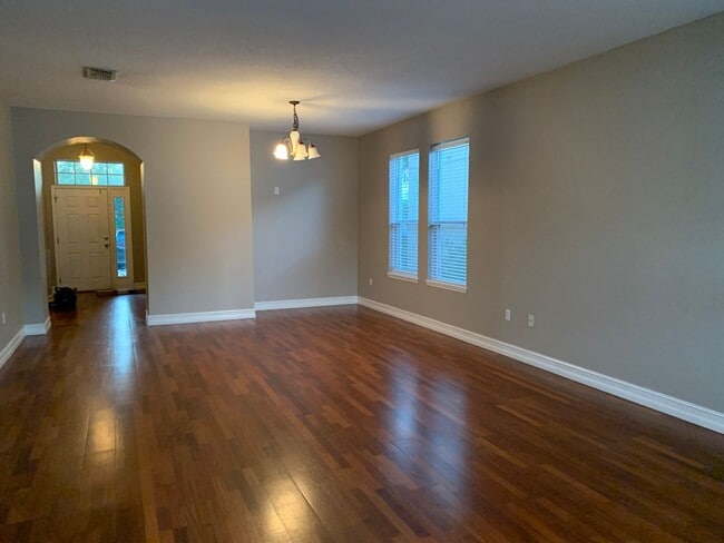 Building Photo - MOVE IN SPECIAL- Charming 3/2 home w/ formal office/4th bedroom and fenced yard in Harmony