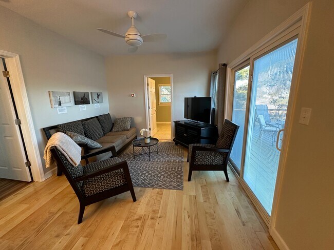 Living room off queen bedroom with sliding glass doors to sun deck - 4804 Friends School Rd