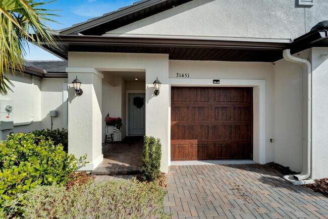 Building Photo - Luxury 55+ Villa with Lagoon Access in Med...