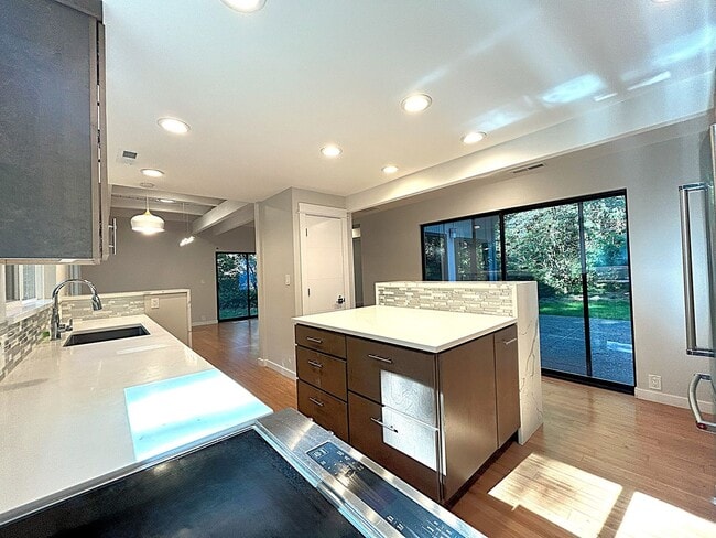 Building Photo - Gorgeous mid century modern home featuring...