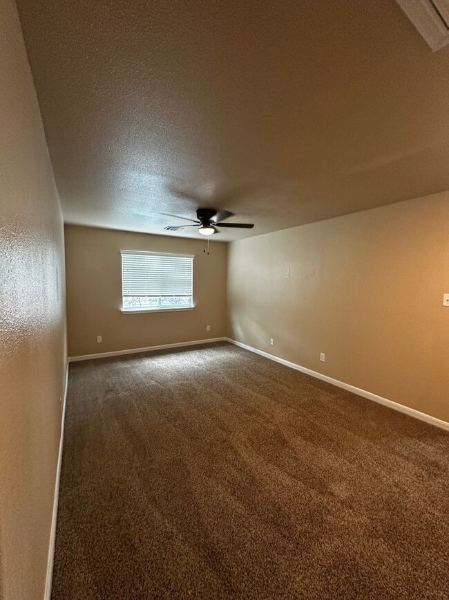 Building Photo - Spacious 5-Bedroom with Elegant Upgrades & Expansive Backyard in Trophy Ridge Subdivision