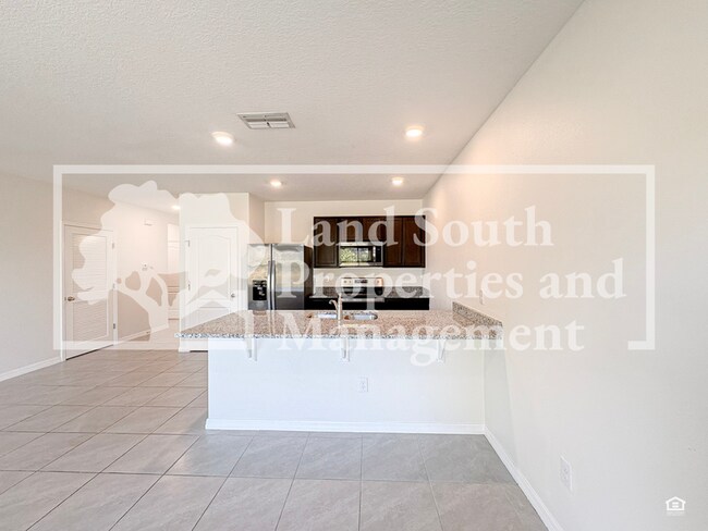 Building Photo - 5781 Arlington River Dr.