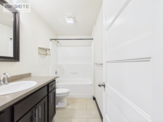 Building Photo - Single-Level 4BR with 3-Car Garage & Fence...