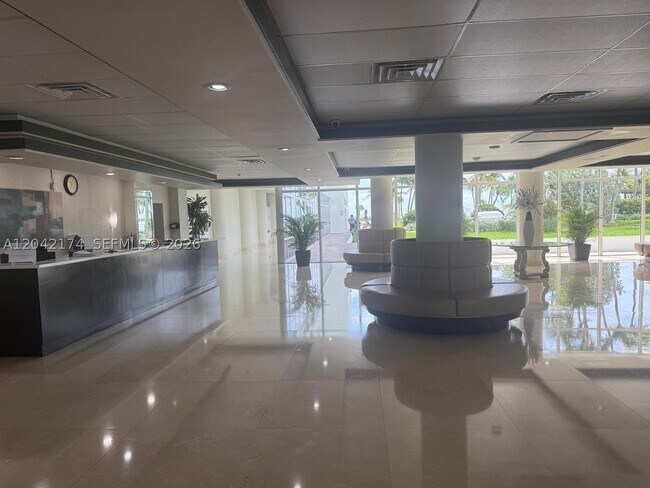Building Photo - 5005 Collins Ave