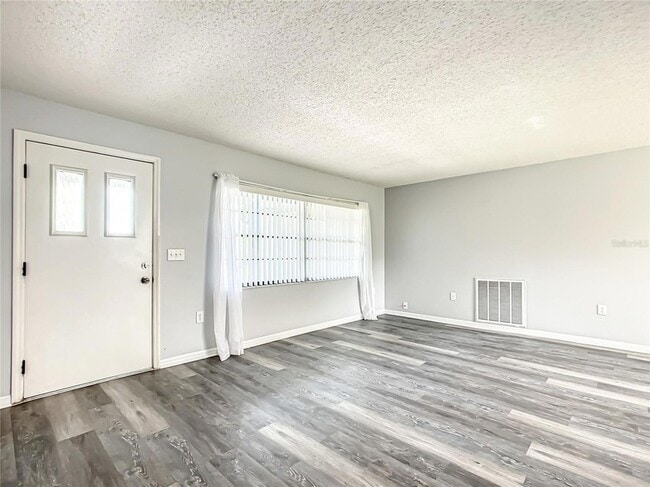 Building Photo - 5576 W Pine Cir