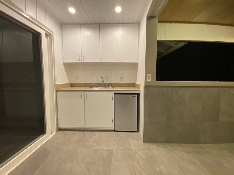 Patio sink, fridge, and cabinets - 3716 Claudine St