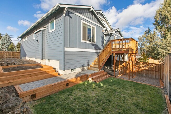 Building Photo - Bring the DOG!  Beautiful Like New NE 4 Bd...