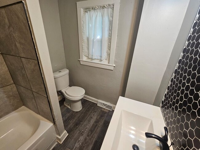 Building Photo - Spacious 4-Bedroom Cleveland Home with Updated Flooring & 2-Car Garage