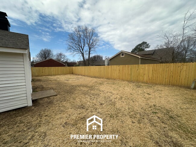 Building Photo - Quiet 3BR/2BA Cove Near Southwind | Soaring Ceilings & Floor-to-Ceiling Stone Fireplace