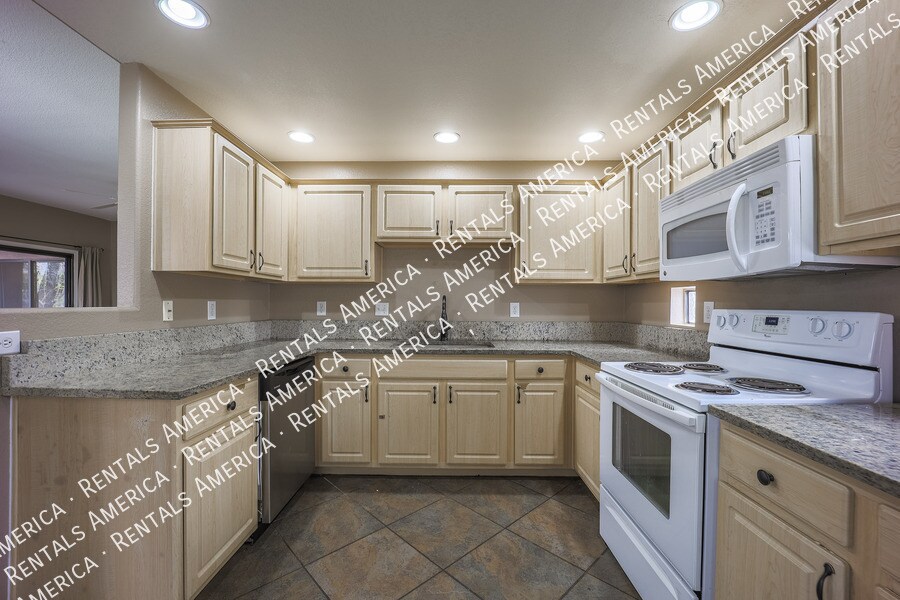 Building Photo - 9555 E Raintree Dr