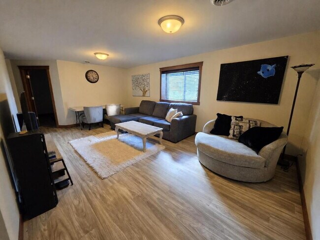 Building Photo - FREE SEPTEMBER RENT for this Spacious 4-Bedroom Home with Vaulted Ceilings with Finished Basement...