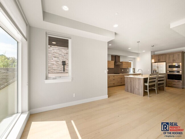 Building Photo - Spacious 3-Bedroom Townhome with Finished ...