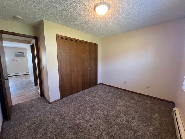 Building Photo - Fully Renovated 2-bed, 1-bath Apartment with a Garage Stall!