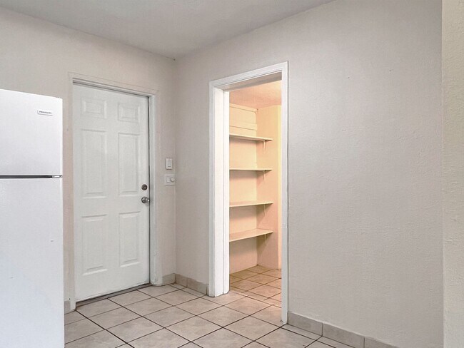 Building Photo - Three-Bedroom Home with Spacious Family Bo...