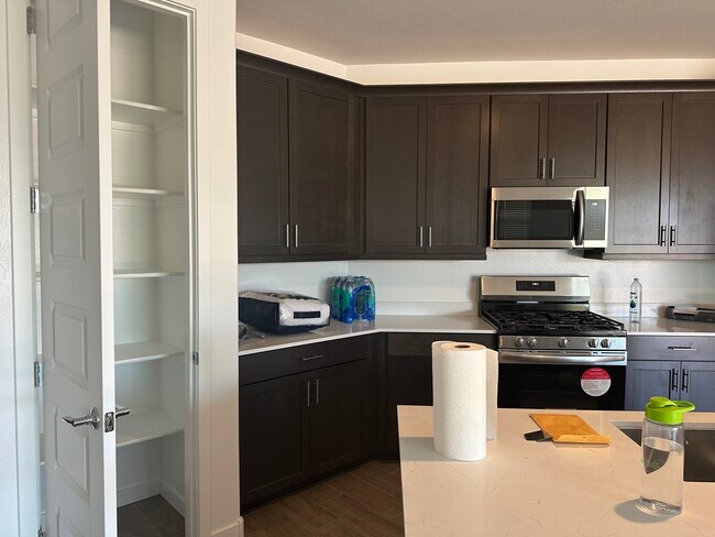 Open Kitchen and pantry - 3110 N 199th Dr