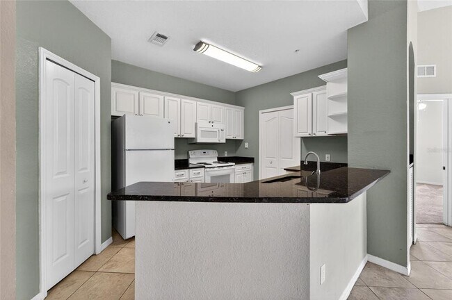 Building Photo - 5611 Legacy Crescent Pl
