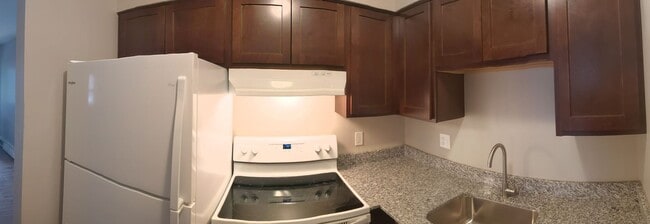 Building Photo - Conveniently located Riverbend Apartments feature a quiet community with a large green space