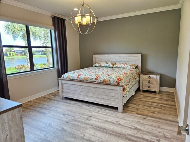 Building Photo - Stunning Model Home – 2 Bedrooms plus Den,...