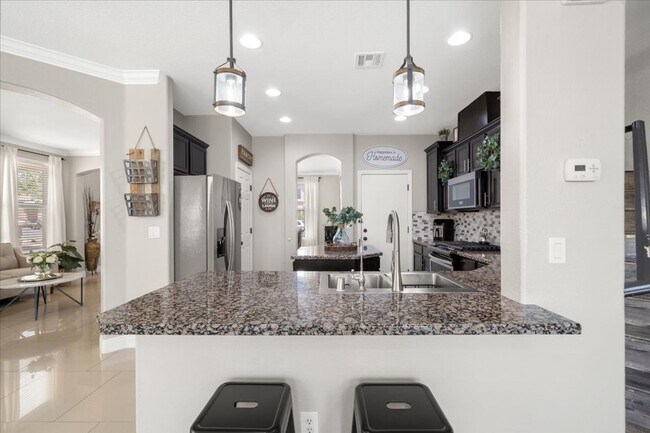 Building Photo - Luxurious, Exceptional Entertaining 5 Bedroom Home Featuring Expansive Indoor-Outdoor Living