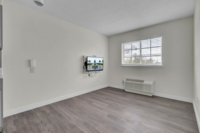 Building Photo - FIRST MONTH FREE- STUDIO APT- Available 1/1/2026