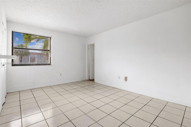 Building Photo - 10050 NW 9th St Cir