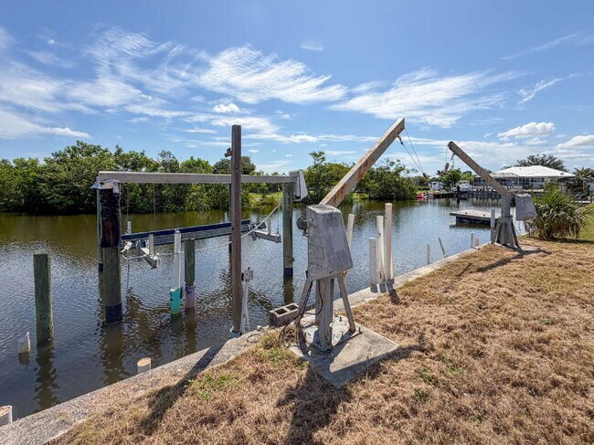 Building Photo - RENT THIS CANAL FRONT HOME WITH ZERO DEPOSIT DOWN