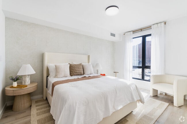 2BR, 2BA - 907SF - Primary Bedroom - The Bay