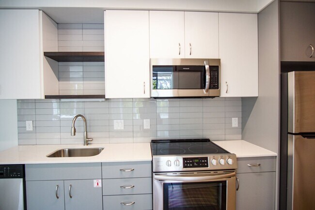 Building Photo - Modern 1-Bed w/Condo-Grade Finishes, Washe...