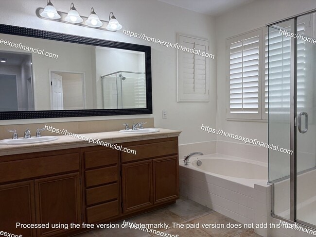 Building Photo - 8157 Garden Gate St