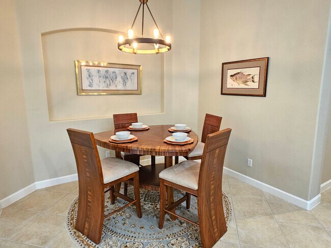 Building Photo - Annual Furnished or Unfurnished 3 Bedroom 2 Bathroom Second Floor Condo in Venetian Golf & River ...