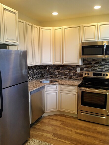 Kitchen with New Stainless Steel Appliances, - 111 Mulberry St