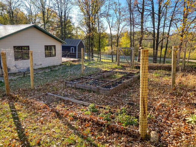Raised beds in fenced in garden - 1606 S Lake Irving Dr SW