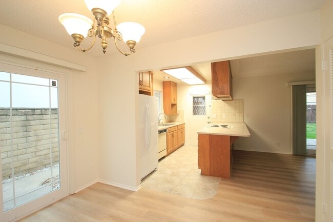 Building Photo - Welcome to this beautifully refreshed 4-bedroom, 2-bath two-story home located in desirable North...