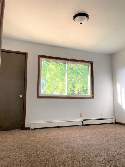 Bedroom with outdoor balcony - 318 E Brown St