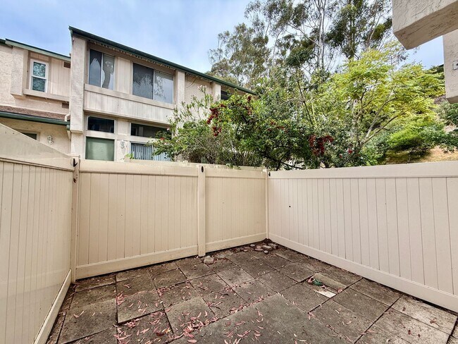 Building Photo - Move in Ready! 2BD Townhome! New Carpet! Two Patio Spaces! Attached Garage!