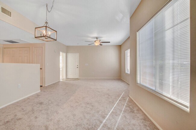 Building Photo - FIRST FLOOR CONDO IN GATED COMMUNITY W/ SINGLE CAR GARAGE