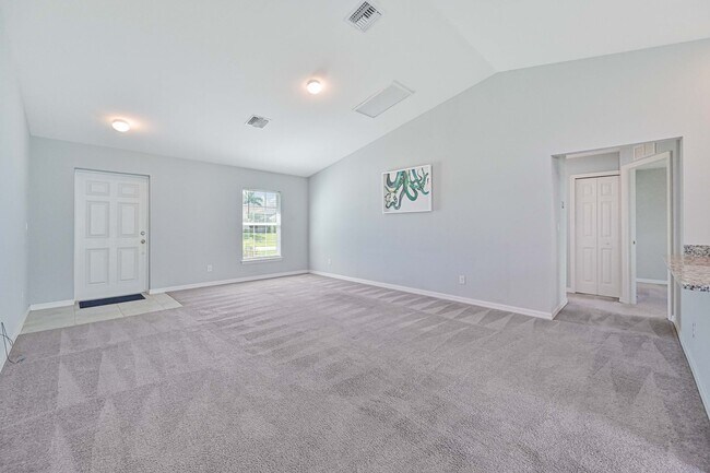 Building Photo - Spacious Three-Bedroom Home with Open Floor Plan, Large Yard