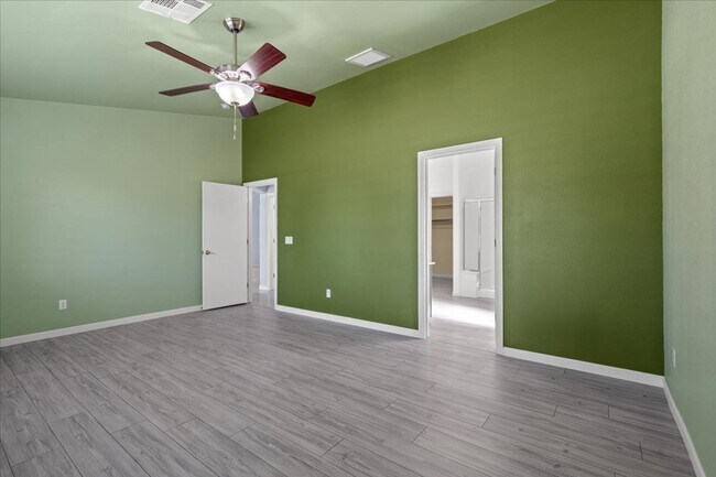 Building Photo - Multiple Living Areas 4-Bedroom Retreat with Vaulted Ceilings & No Carpet